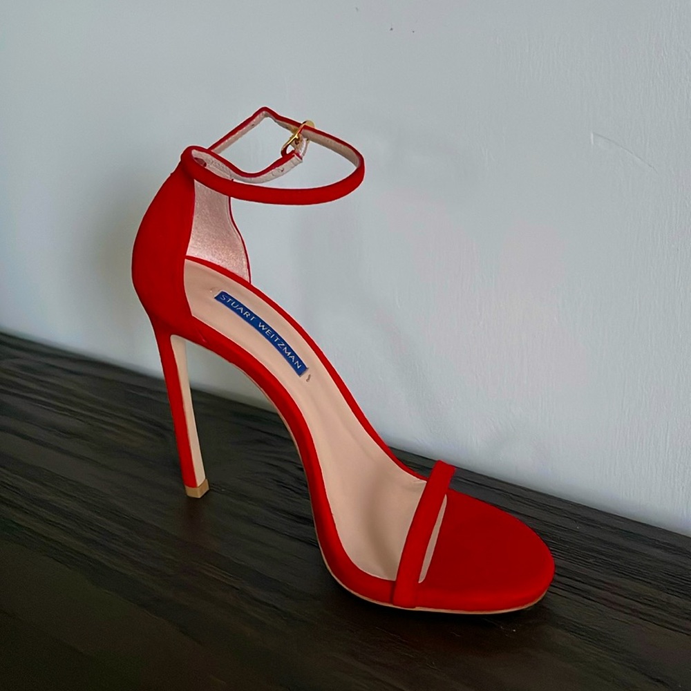 GORGEOUS red hot size 8 Stuart Weitzman heels. Never worn, still in box!